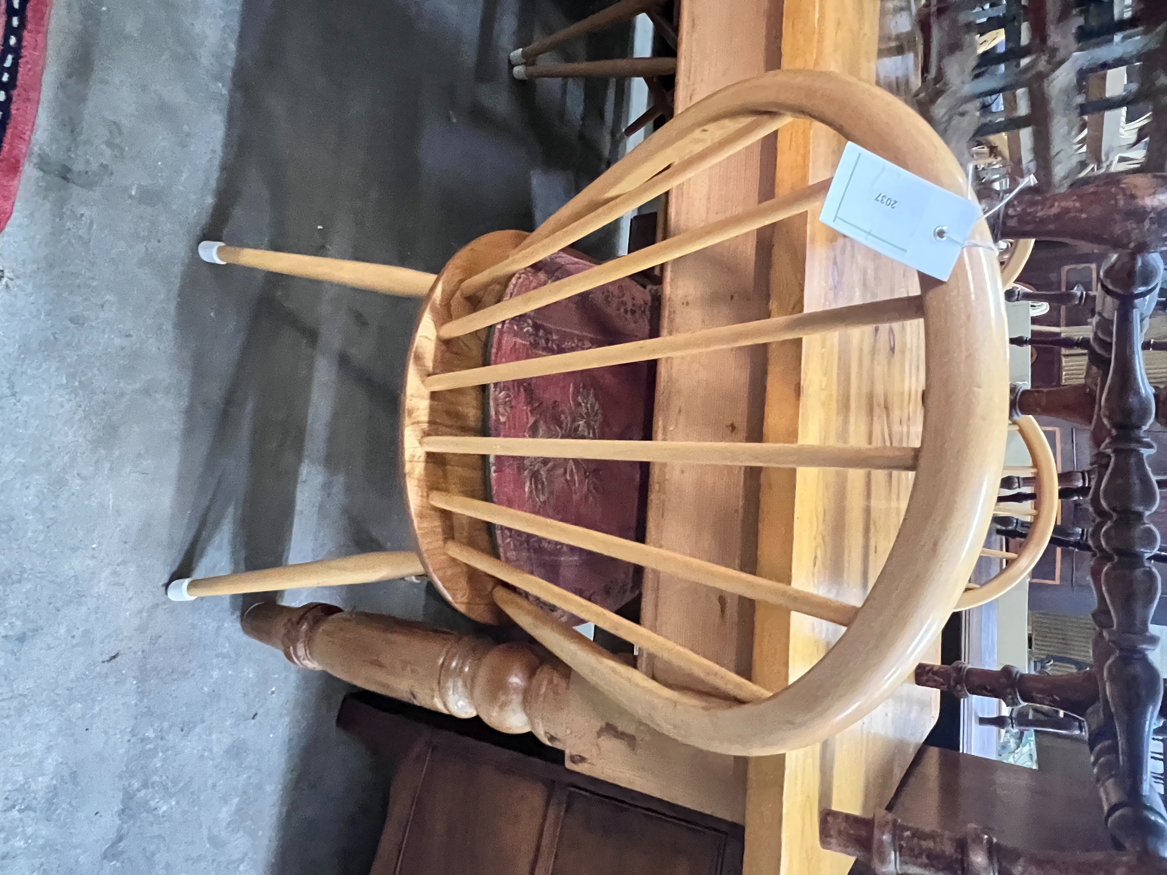A set of six Ercol light elm and beech comb back chairs, width 45cm, depth 44cm, height 89cm
